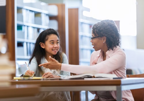 teacher consultant in school with black students